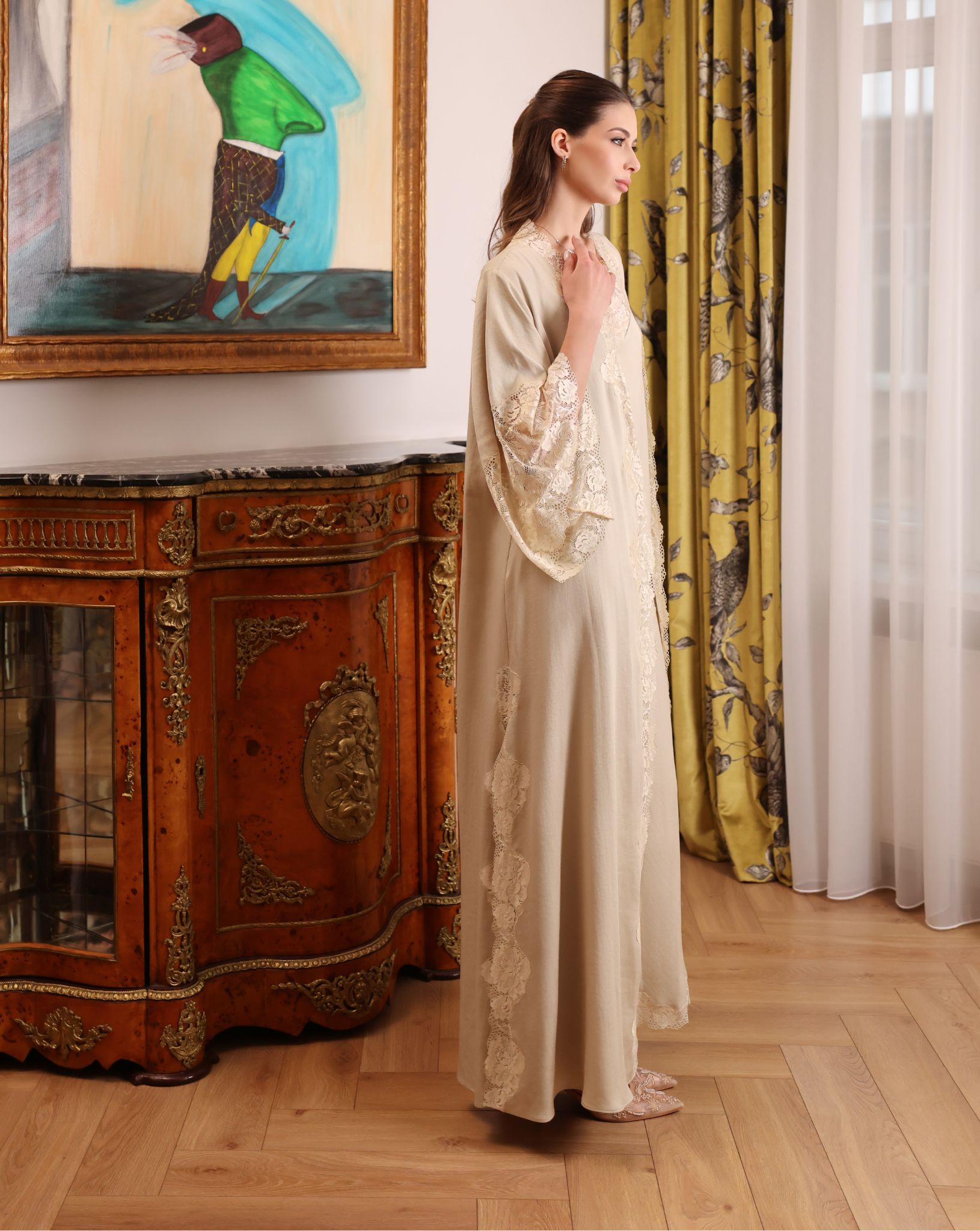 Side perspective of the ensemble, highlighting the graceful coverage and refined lines of the lace-edged silhouette.