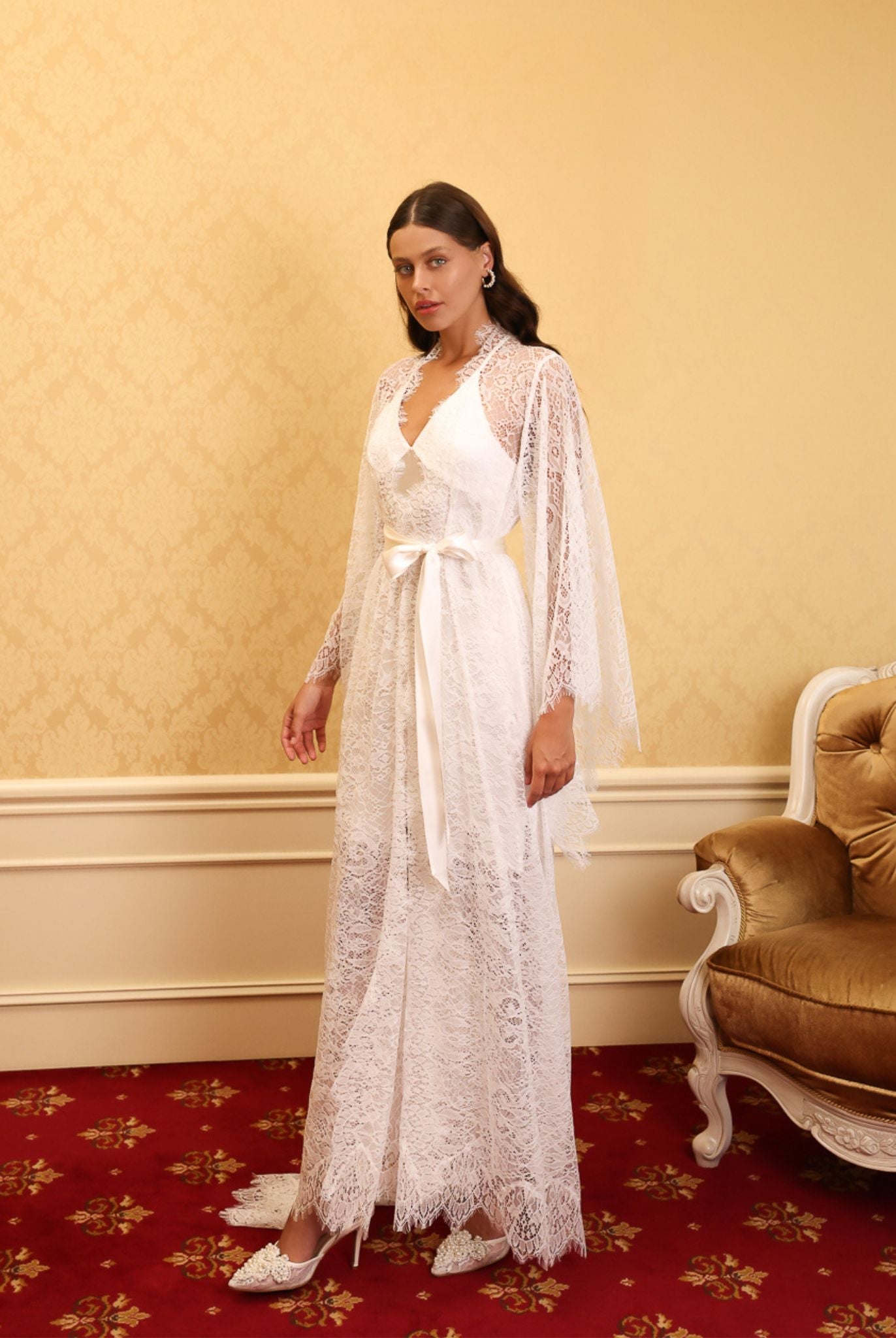 Side view of a luxury silk and lace ensemble, highlighting the refined textures and sophisticated feminine silhouette.