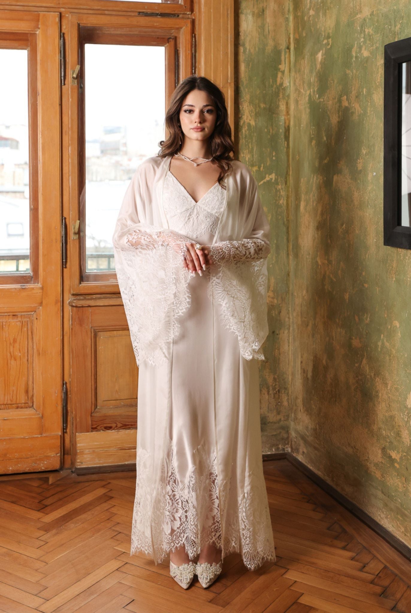 Luxurious Silk Robe and Nightgown Set featuring wide airy sleeves adorned with intricate floral lace patterns.