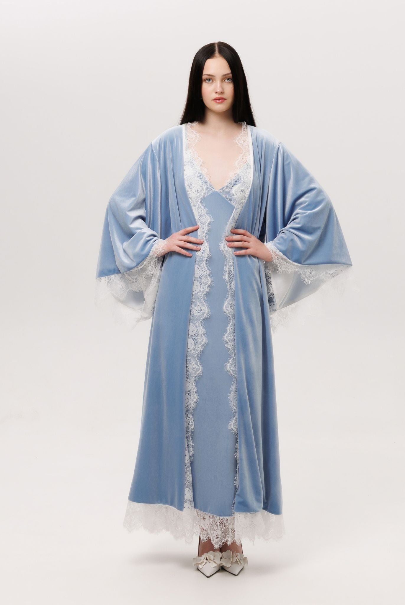 Standing in the Velvet Robe and Nightgown Set with hands on the waist, showcasing the kimono style robe decoration.