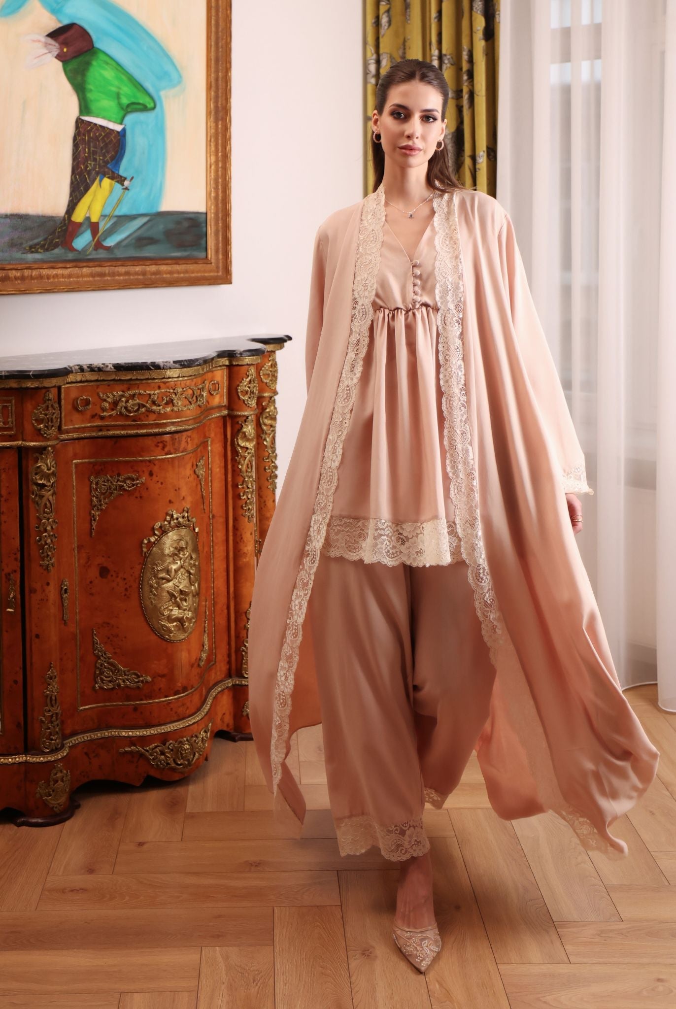 A full-length shot of the three-piece ensemble in motion, showcasing the flowing robe and breathable cotton fabric.