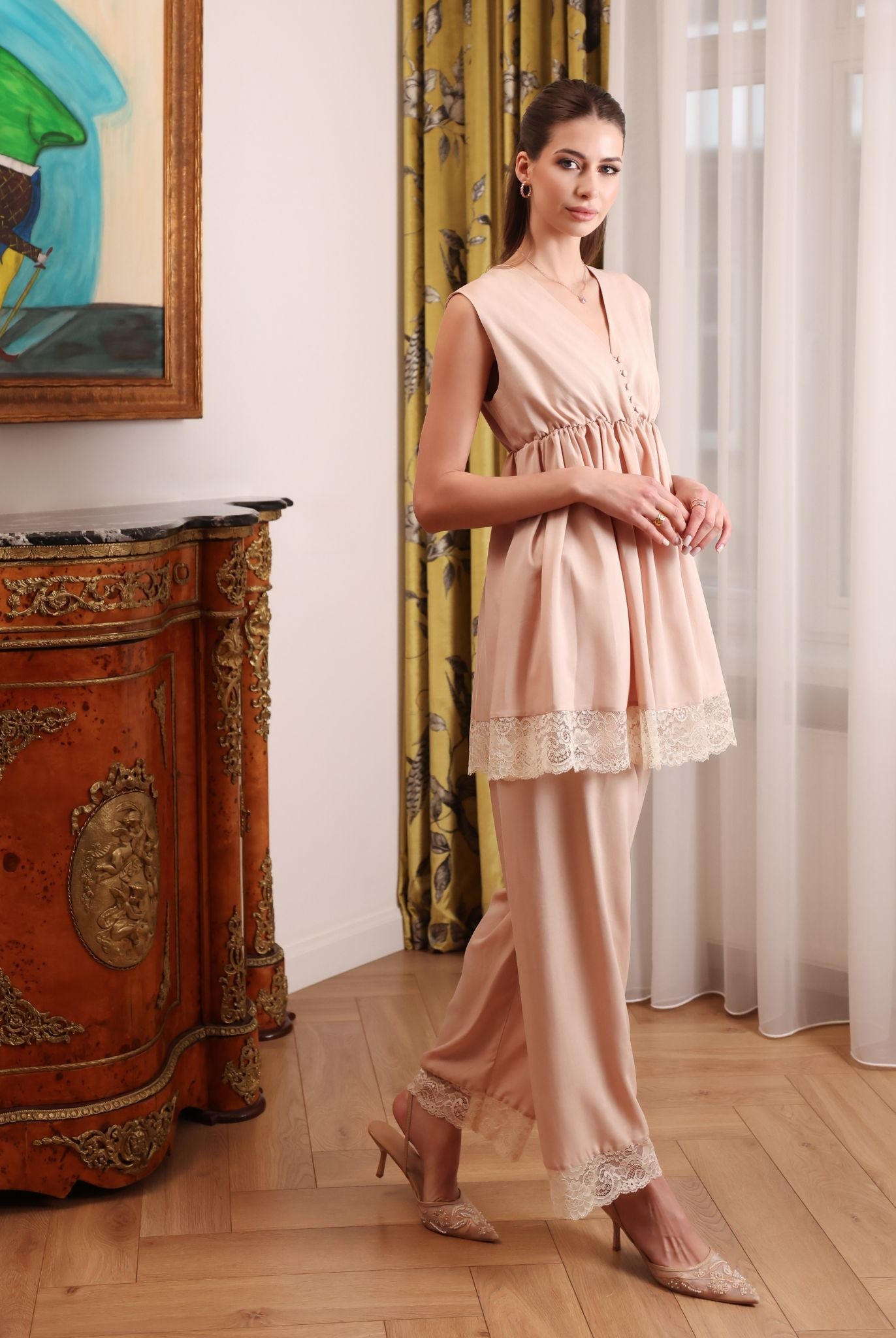 The pajama top and pants shown without the robe, emphasizing the relaxed fit and all-day ease of the cotton material.
