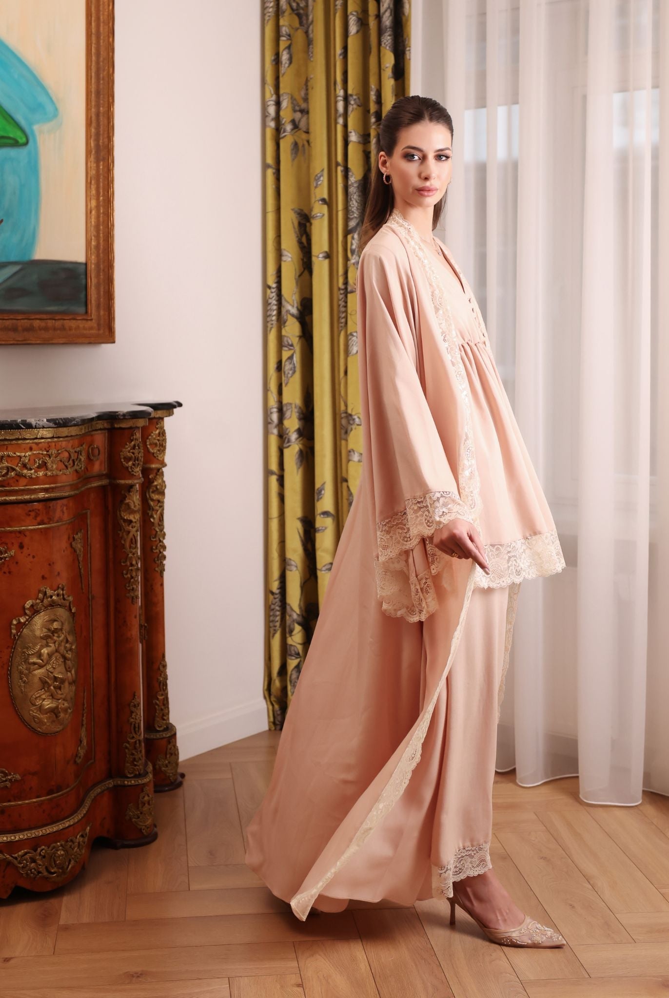 A side perspective of the complete layered set, illustrating the effortless comfort and timeless charm of the design.