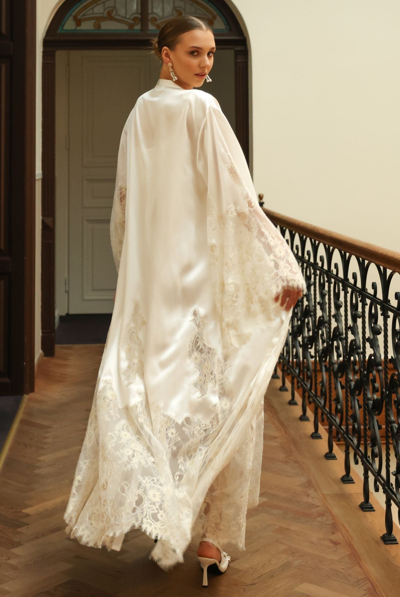 Rear perspective of the flowing silk wrap, emphasizing the timeless elegance and heavenly silhouette of the set.