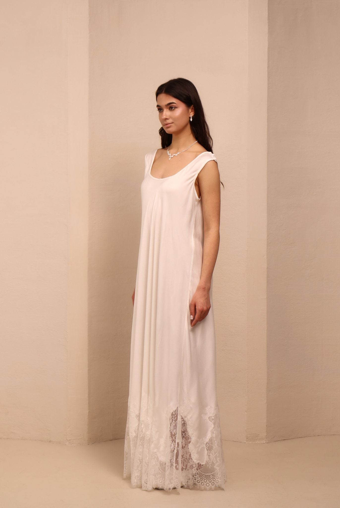Side view of the white Robe and Nightgown Set dress, designed to support you through every stage of motherhood.