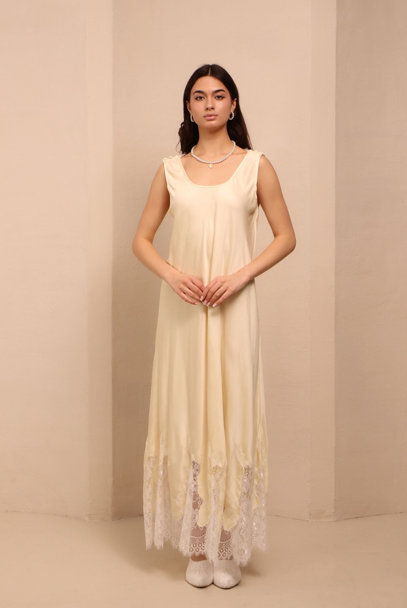 Frontal shot of the vanilla nightdress, featuring discreet shoulder buttons for effortless breastfeeding access.