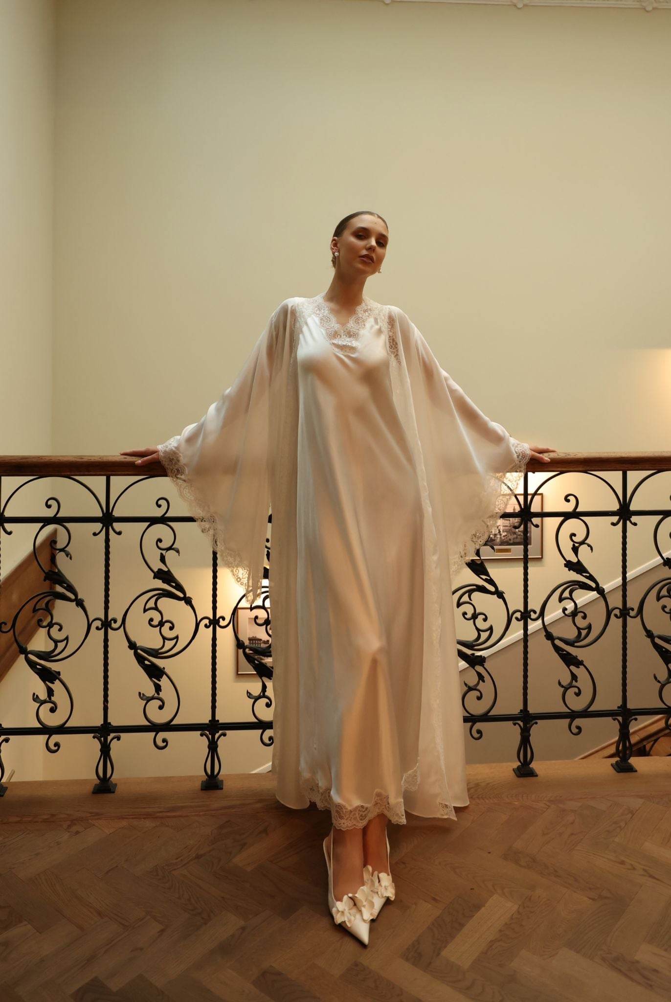 Graceful pose showcasing the understated elegance and sophisticated style of the 100% mulberry silk collection.