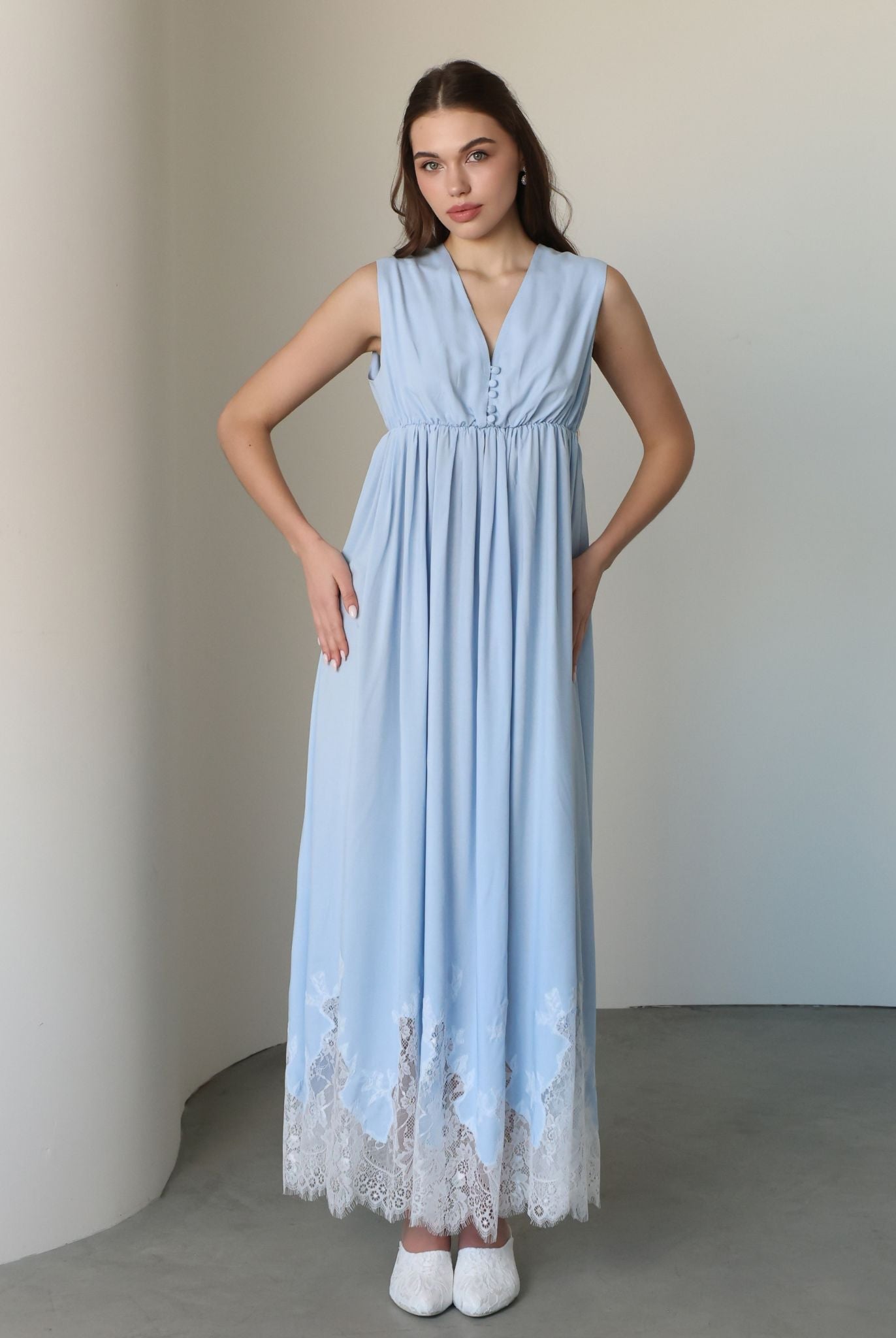 Frontal view of the sleeveless nightgown, featuring hidden front openings for easy and quick nursing access.