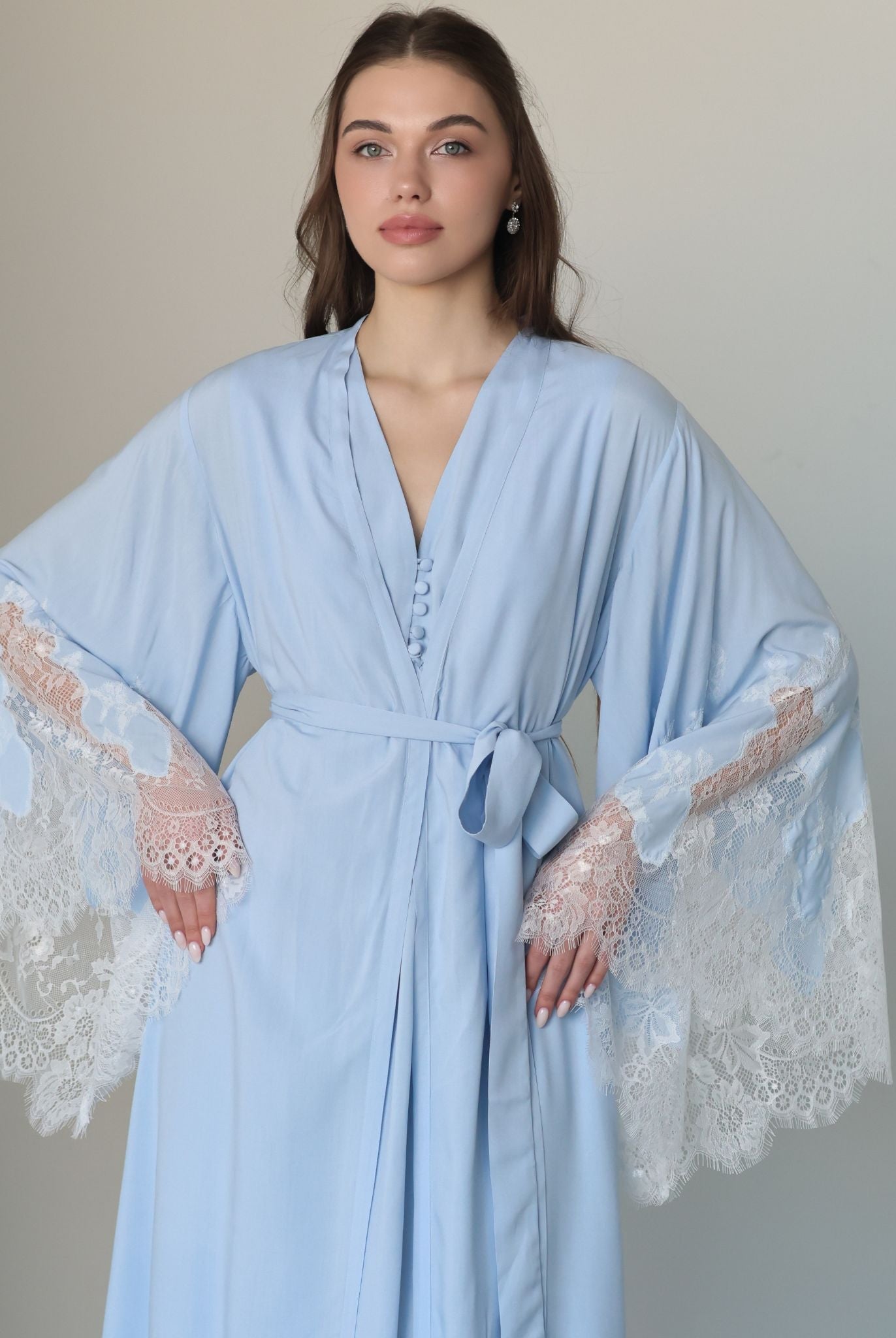 Mid-length shot of the attire tied at the waist, highlighting a well-put-together look for daily wear at home.