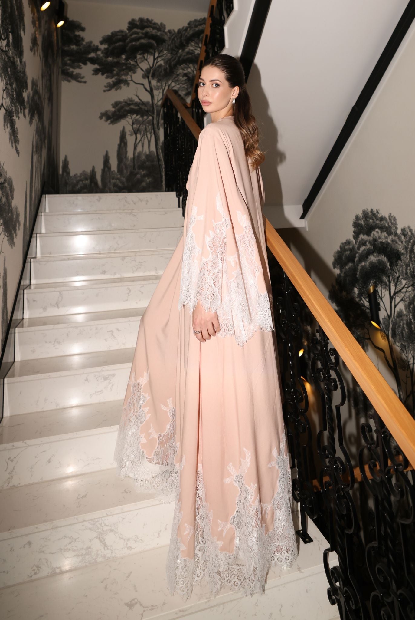 A dynamic shot of the long robe reaching the ankles, illustrating a well-put-together look for daily movement.