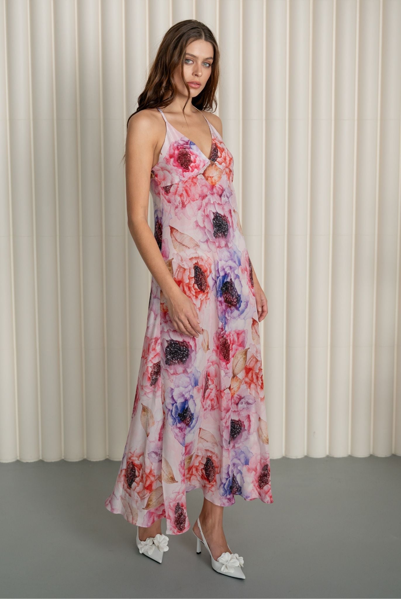 Frontal view of a structured silk crepe nightdress with a romantic peony print and a comfortable, perfect fit.