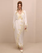A dynamic motion shot of the  Bridal Robe and Nightgown Set, capturing how the lightweight material moves with every step.