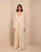 A serene static shot of the ensemble, showcasing the delicate sheer lace robe draping beautifully over the body.