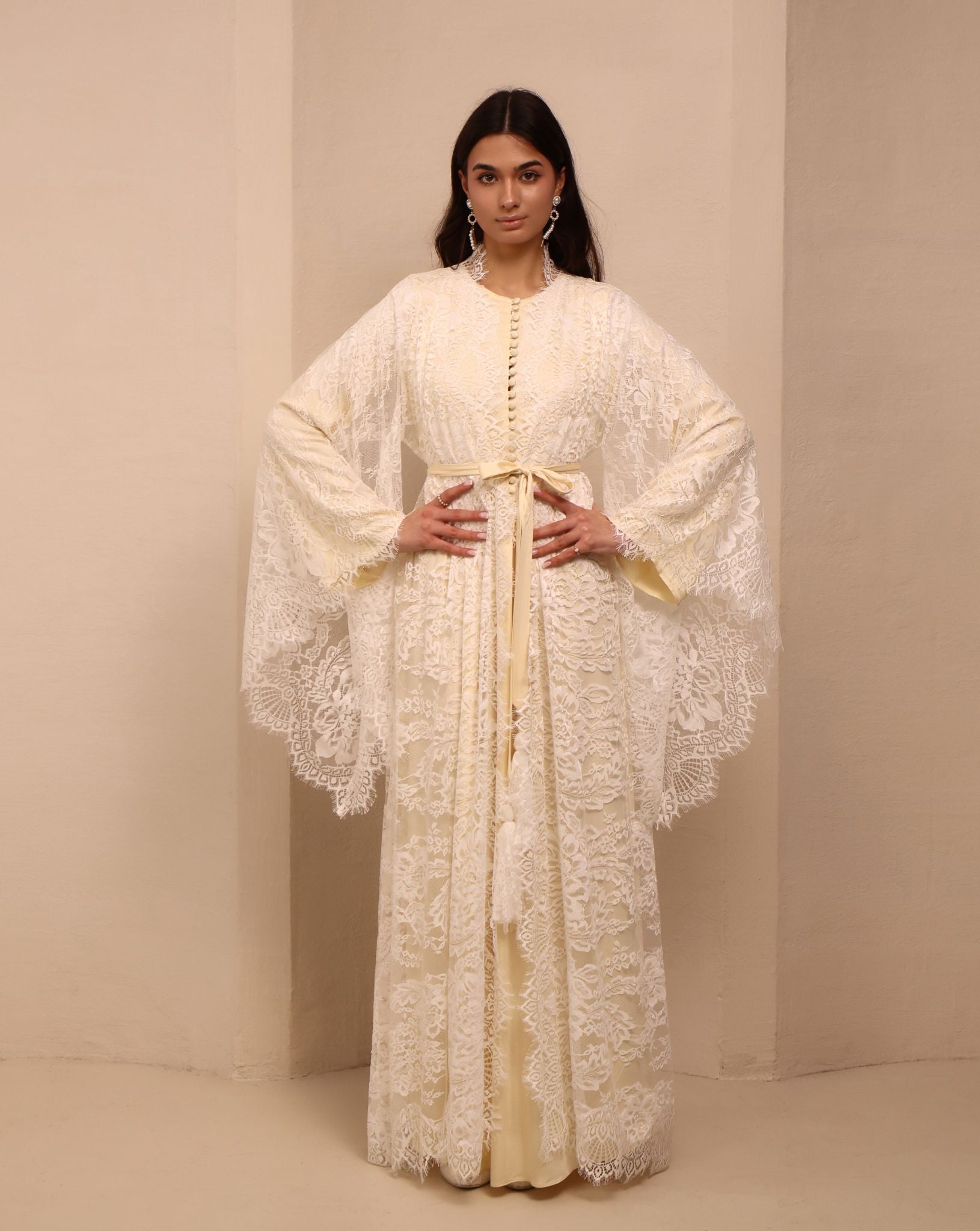 A static shot of the Robe and Nightgown Set tied at the waist, illustrating a vision of grace and soft presence.