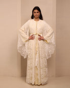 A static shot of the Robe and Nightgown Set tied at the waist, illustrating a vision of grace and soft presence.