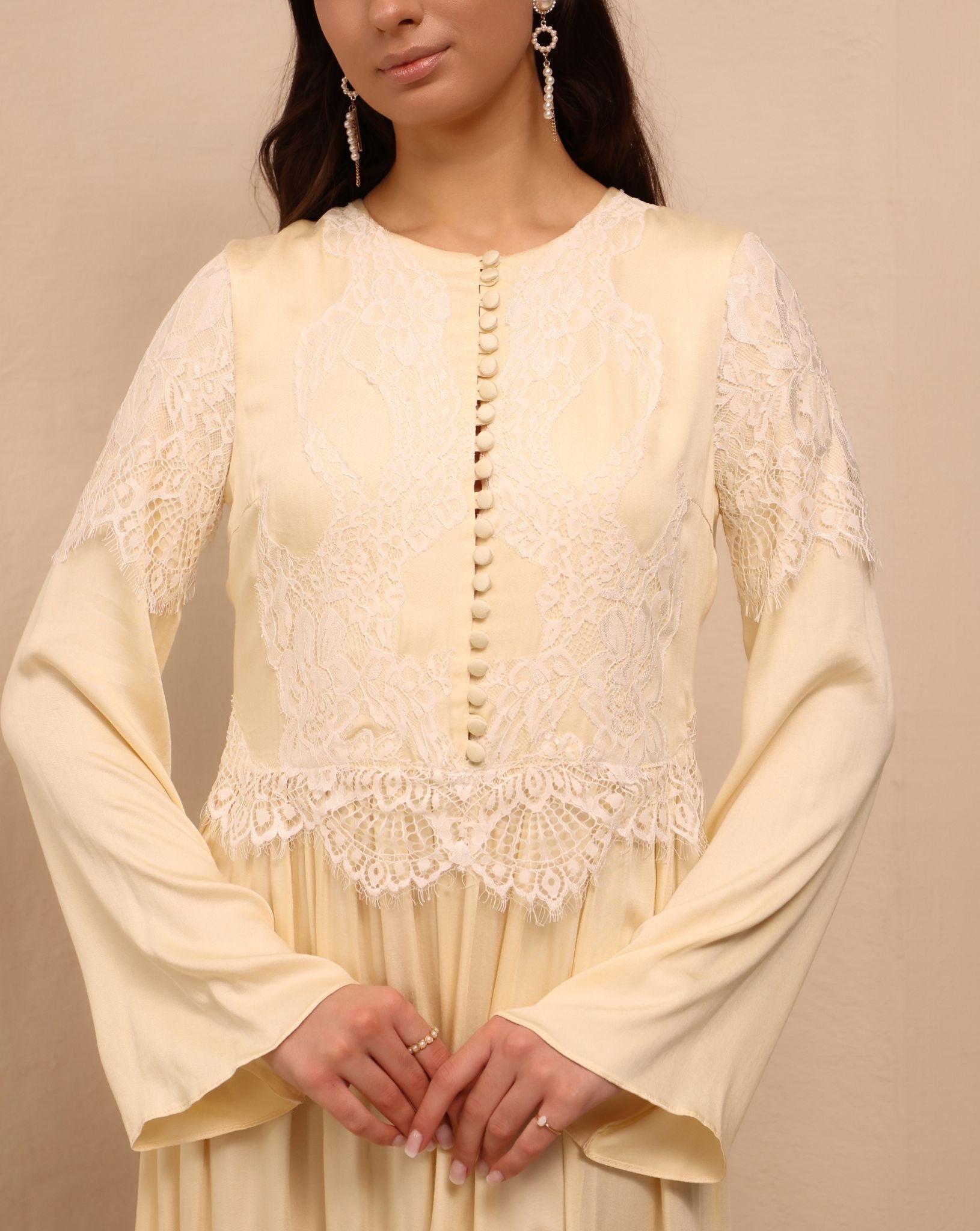 A detailed close-up of the Robe and Nightgown Set, focusing on fabric-covered buttons and delicate lace patterns.