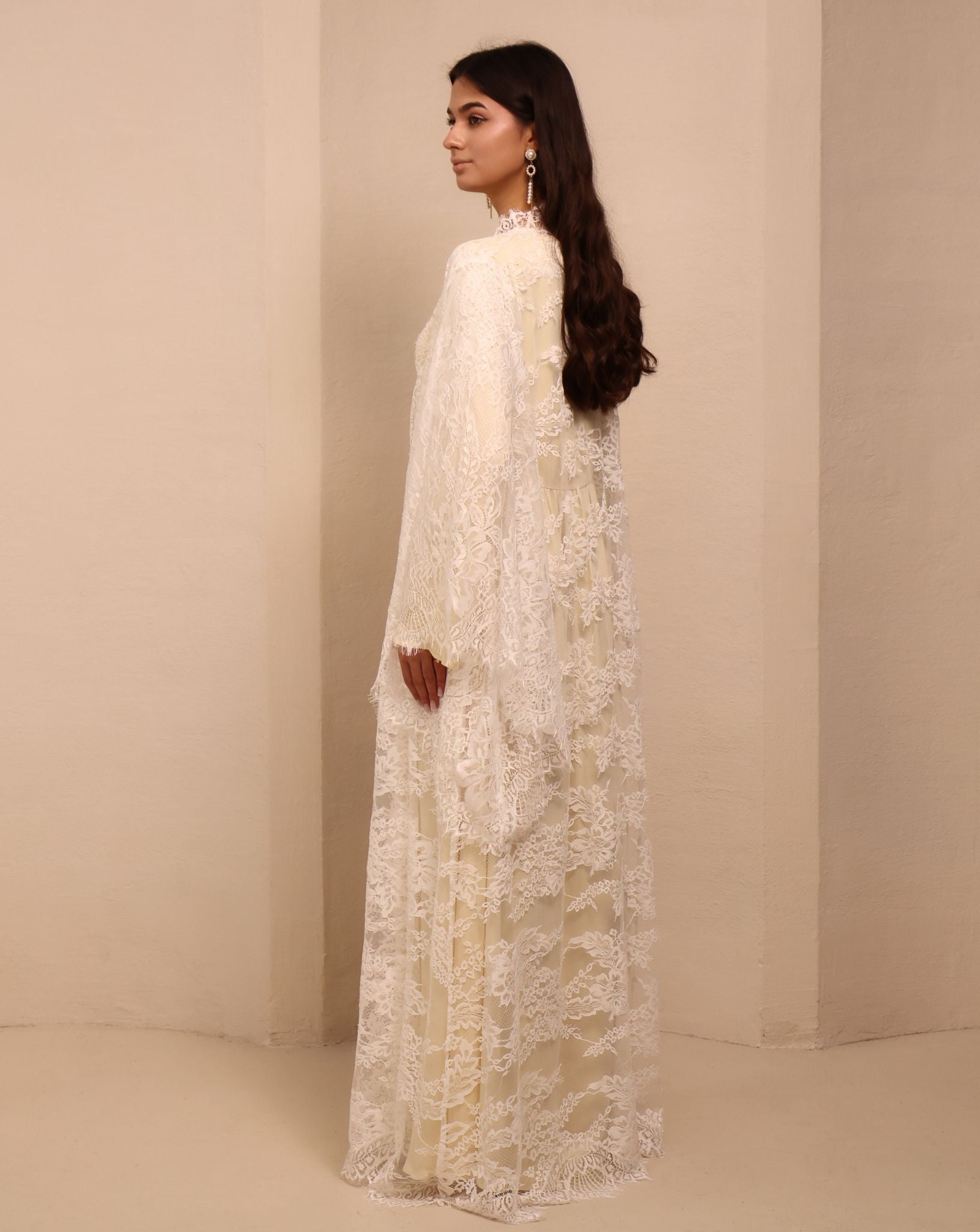 Side perspective of the modest ensemble, showcasing the breathable drape and refined silhouette of the long robe.