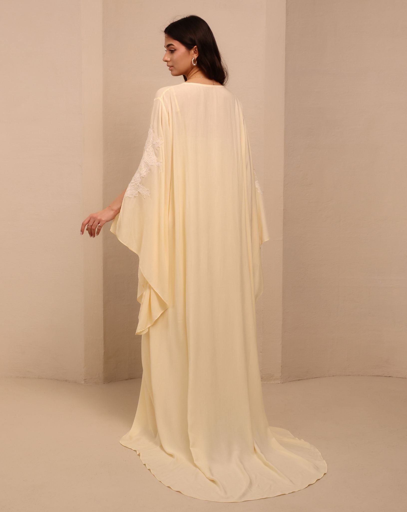 A full-length back view of the Robe and Nightgown Set, emphasizing the graceful flow and the elegant train.