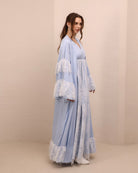 Side perspective of the attire, highlighting the effortless A-line silhouette and the soft, gathered waist.