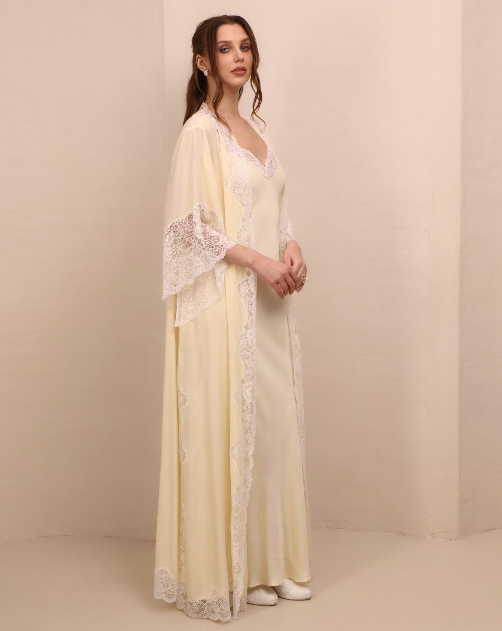 Side perspective of the ensemble, illustrating the elegant drape and the sophisticated allure of the lace-edged robe.