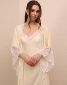 A mid-length shot highlighting the detailed lace sleeves and the graceful neckline for unforgettable moments at home.
