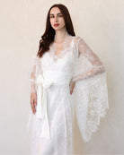 Side view of sheer lace bridal robe with flared sleeves