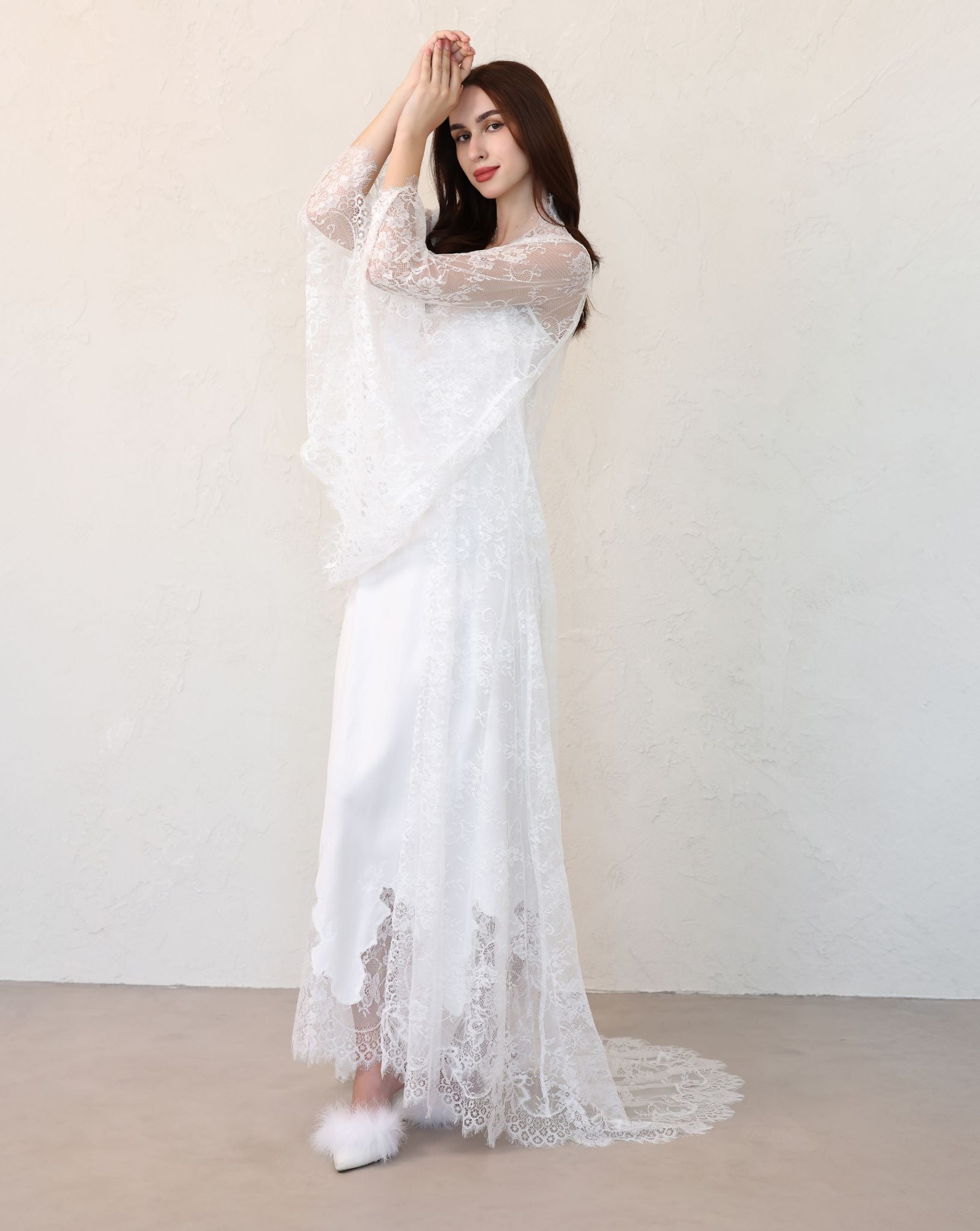 Elegant bridal look featuring robe cinched at the waist