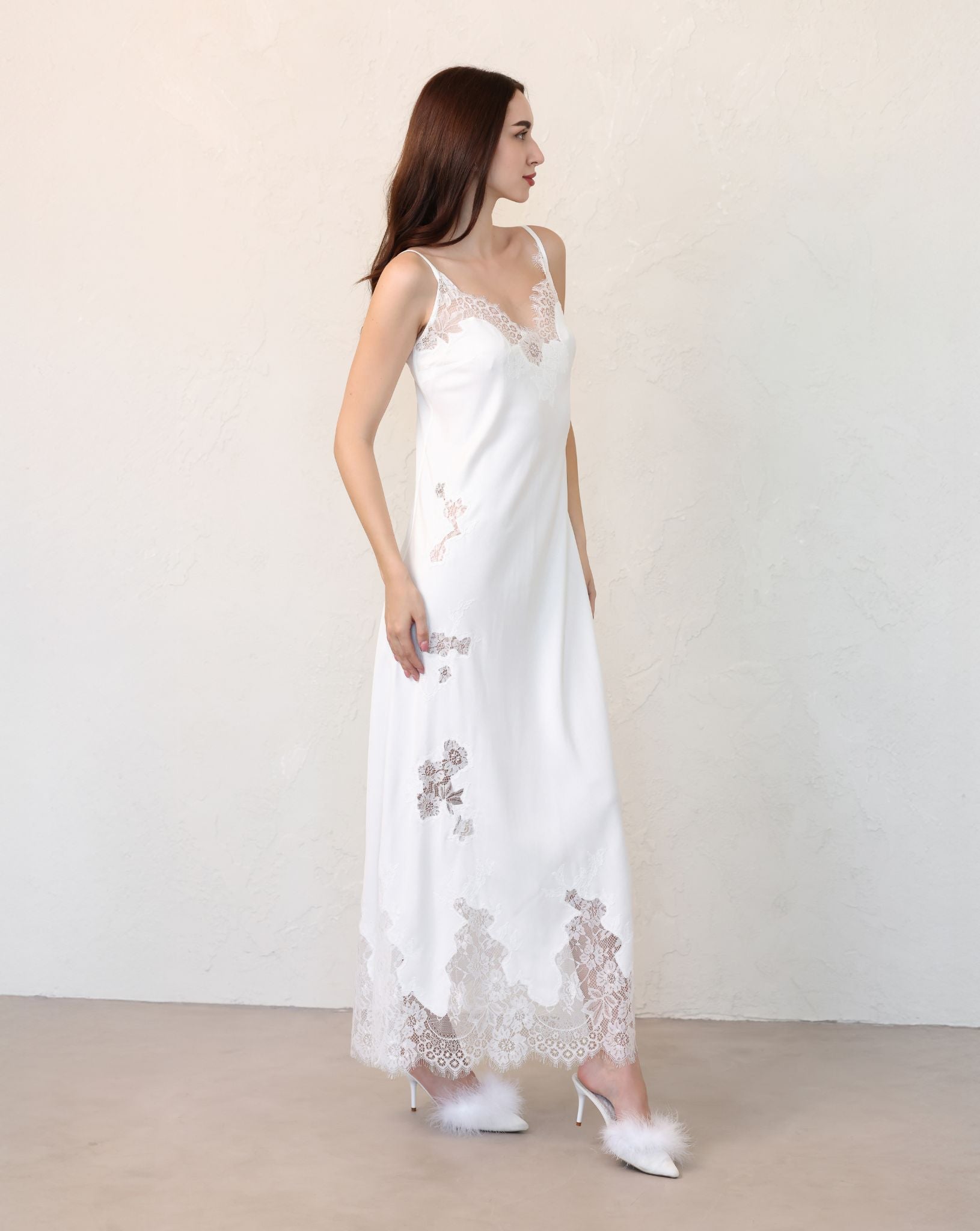 Back view of sheer lace robe with gentle train