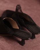 Top view of the Satin Slippers featuring the brand logo on the soft padded genuine leather insole.