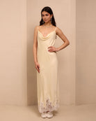 Frontal perspective of the vanilla nightgown, designed to caress the skin with its smooth and light material.
