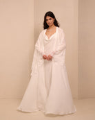 A full-length view of the white Robe and Nightgown Set, capturing its luminous and ethereal silhouette.