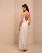 Side shot of the nightdress, showcasing the elegant drape and the beautiful V-cut detail on the back.