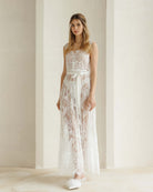 Front view of the delicate nightgown featuring a soft tie at the waist to highlight the figure gracefully.