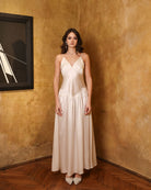 Frontal view of the princess-cut nightgown, highlighting the smooth silk texture and floor-length graceful design.