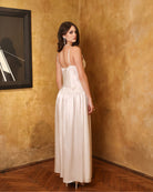 Back view of the silk satin nightdress, highlighting the elegant lines and the sophisticated bridal-style silhouette.