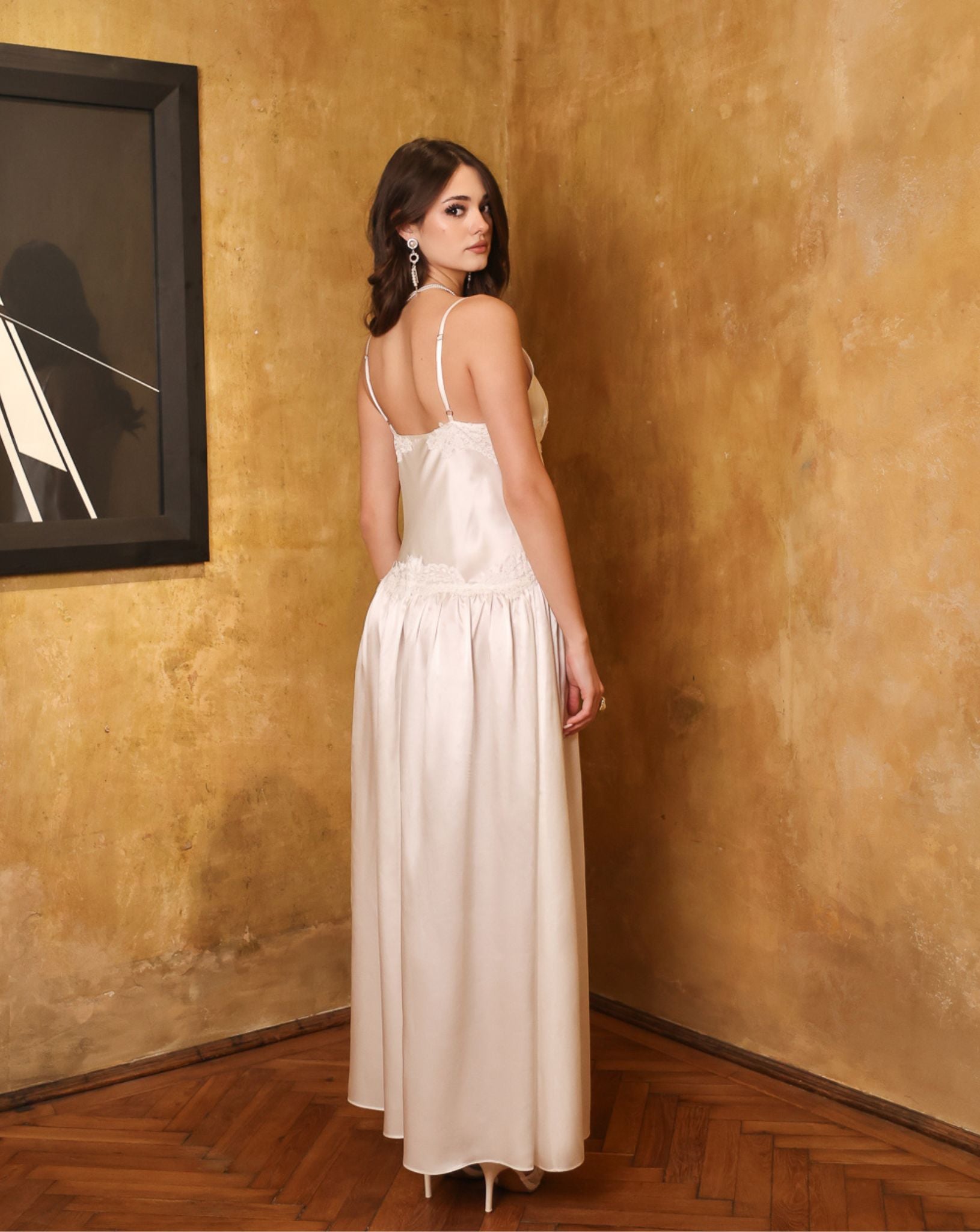 Back view of the silk satin nightdress, highlighting the elegant lines and the sophisticated bridal-style silhouette.