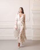 Elegant Silk Robe and Nightgown Set made from 100% mulberry silk, gliding effortlessly during a graceful walk.