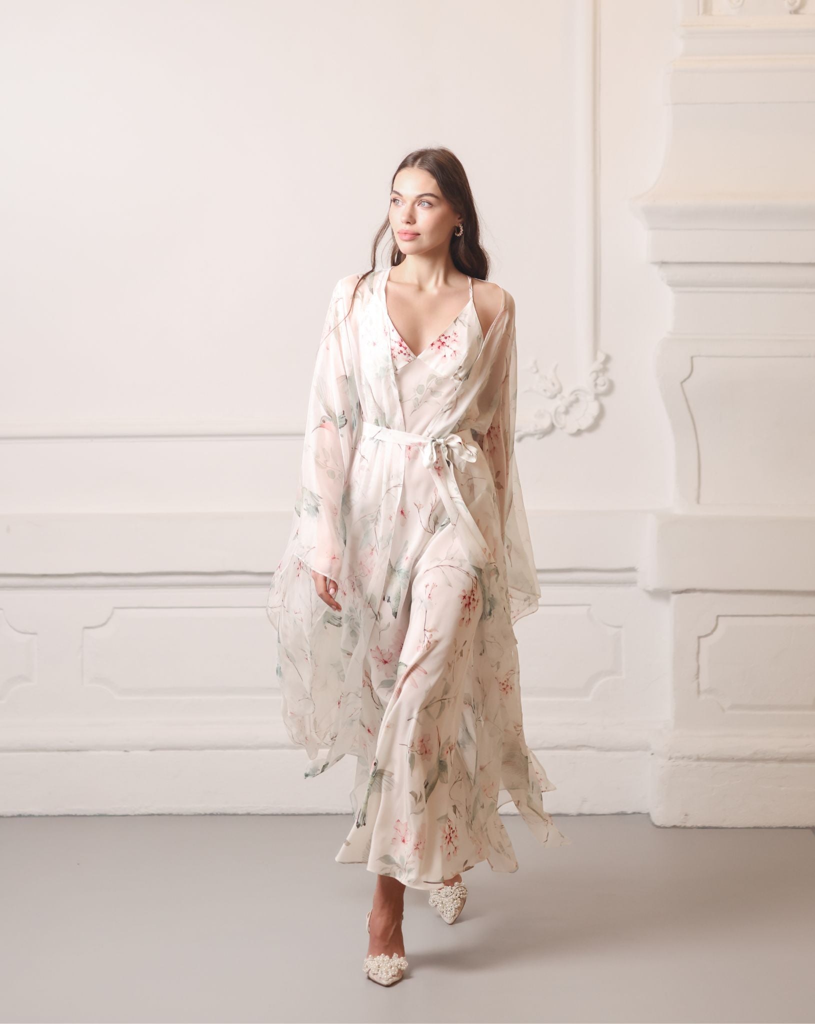 Elegant Silk Robe and Nightgown Set made from 100% mulberry silk, gliding effortlessly during a graceful walk.