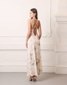 Back view of the silk nightgown highlighting crisscross straps and a mid-open V-cut for a sophisticated look.