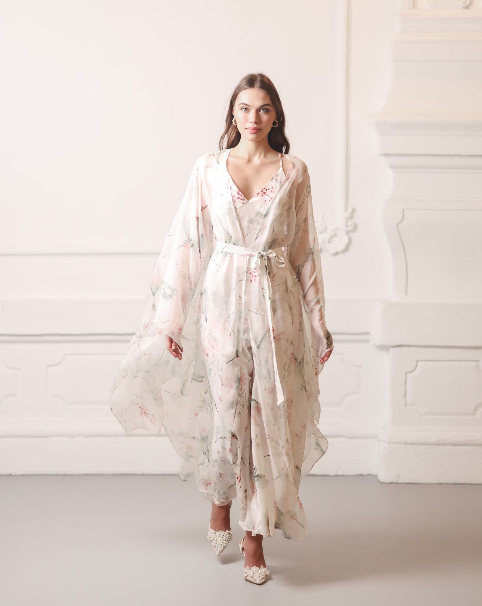 Flowing Silk Robe and Nightgown Set with an exclusive floral print, shown in motion for a romantic look.