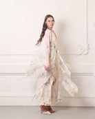 Dynamic shot of a sheer silk chiffon wrap rotating gracefully, highlighting the weightless and airy fabric.