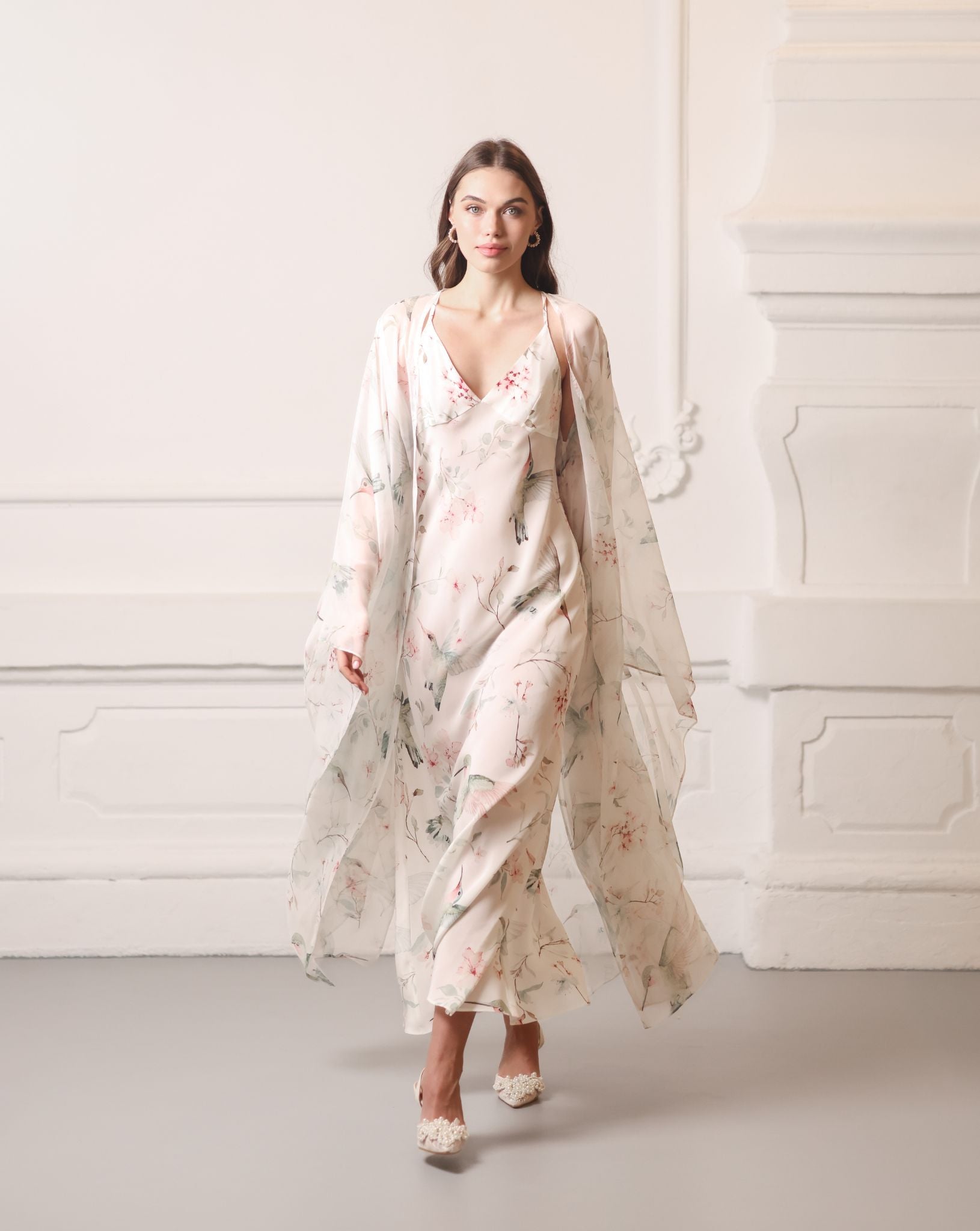 Full-length shot of the sheer silk robe layered over a matching gown, creating a luminous and luxury home look.