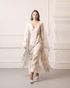 Full-length shot of the sheer silk robe layered over a matching gown, creating a luminous and luxury home look.