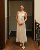 Frontal view of the silk satin nightgown, highlighting the smooth texture and flattering, elegant silhouette.