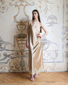 Full-length view of the sleeveless nightgown, highlighting the graceful silhouette that falls just above the ankles.