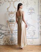 Rear view of the nightgown featuring a mid-open V-cut back and adjustable shoulder straps for a perfect fit.
