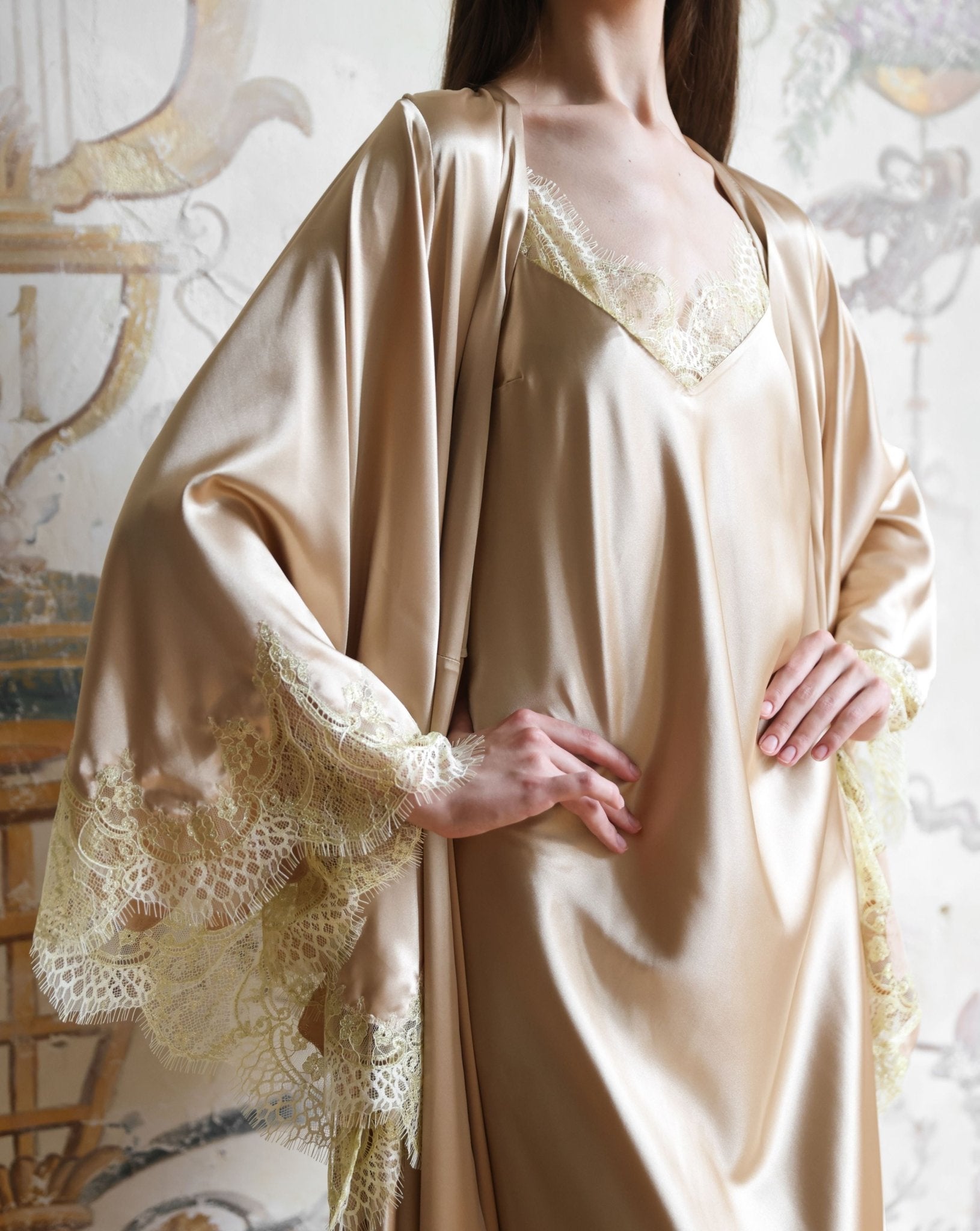 Close-up from neck to hips focusing on the lace-trimmed neckline and the premium silky fabric quality.