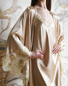 Close-up from neck to hips focusing on the lace-trimmed neckline and the premium silky fabric quality.
