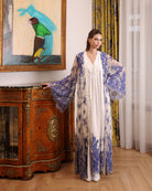 Mid-length view of the tied lace robe over the cotton dress, highlighting the supportive and feminine fit.