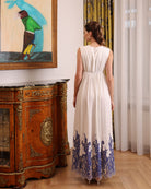 Rear perspective of the maternity nightgown, highlighting the smooth drape and clean, elongated silhouette.